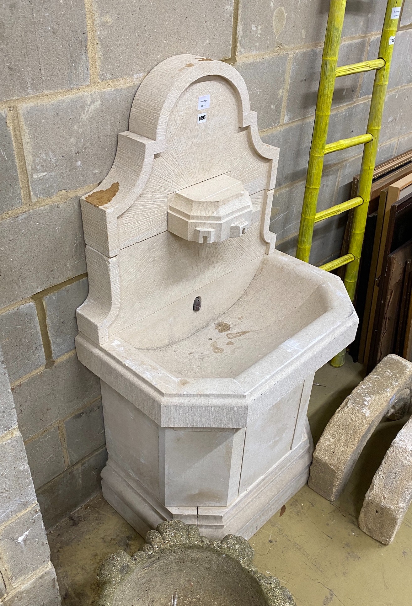 A sectional stone fountain by Latthies, width 79cm, depth 50cm, height 140cm